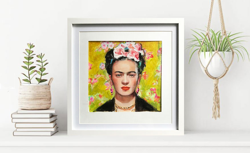 framed painting of Frida Kahlo on a shelf with plants, original art by Becky McCarthy